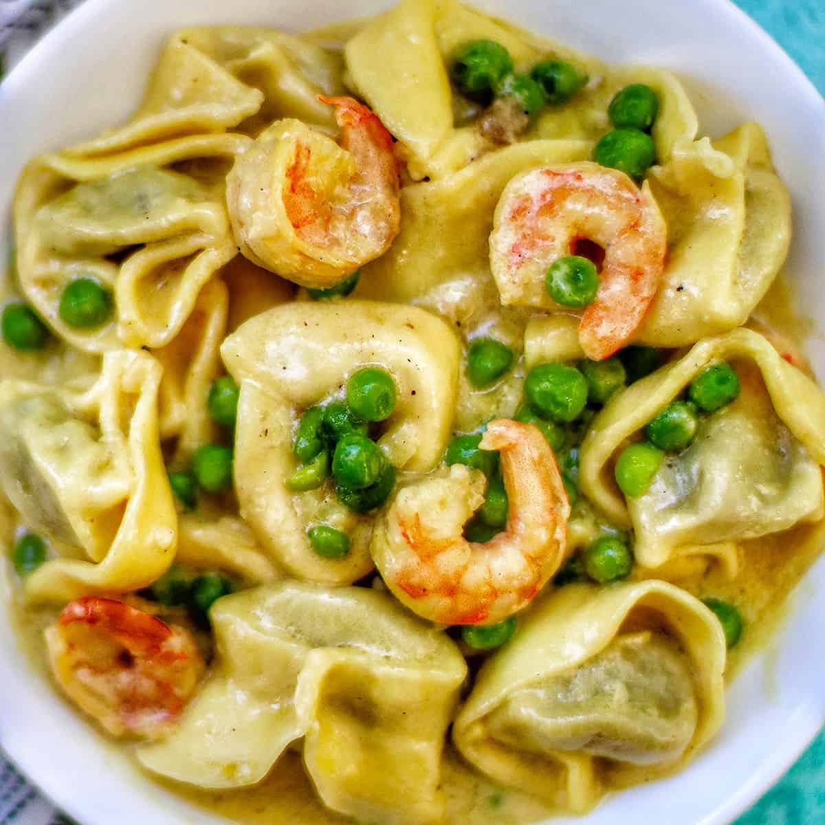 Dairy-Free Shrimp Tortellini with Peas in a bowl