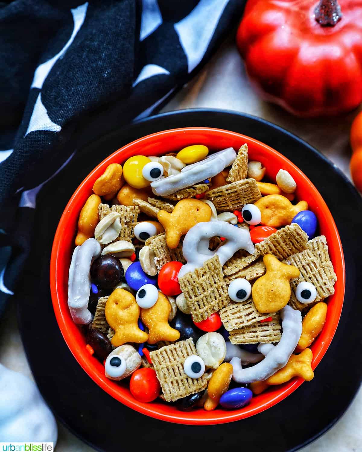 orange bowl with Halloween Snack Mix.