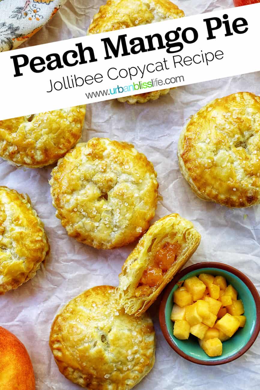 several mini peach mango hand pies on crinkled parchment paper with a bowl of diced peaches and mangoes with title text that reads "Peach Mango Pie Jollibee Copycat Recipe."