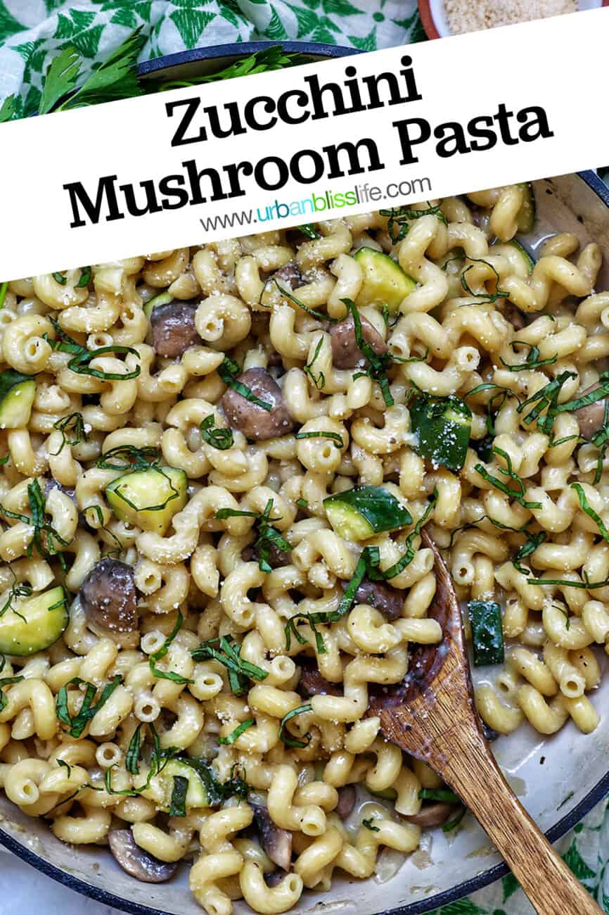 zucchini mushroom pasta in a large saucepan with title text that reads "Zucchini Mushroom Pasta."