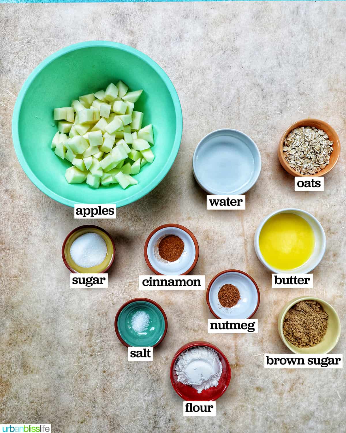 bowls of ingredients to make two bowls of Air Fryer Apple Crisp.