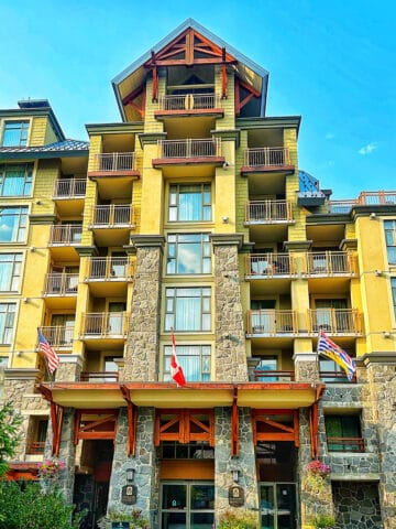 exterior of the pan pacific hotel in whistler village centre in whistler bc canada.