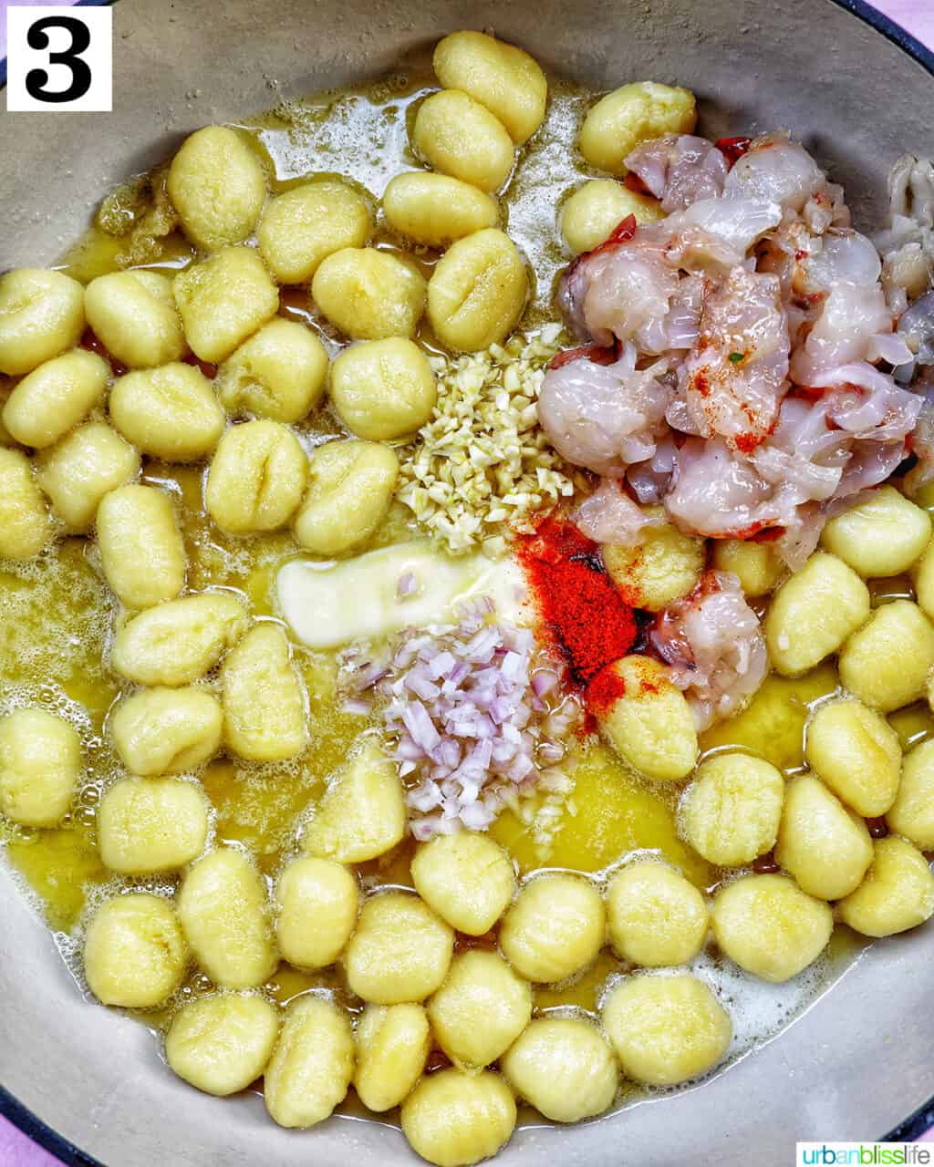 gnocchi, butter, lobster and seasonings in a skillet.
