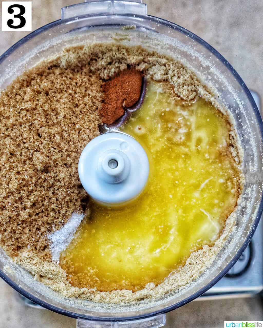 melted butter, graham cracker crumbles, and spices in a food processor.