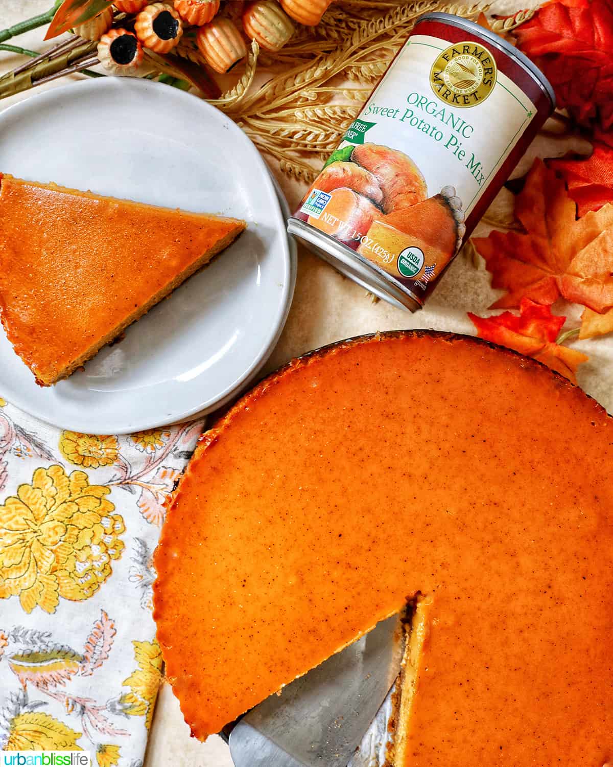 baked sweet potato pie in a pan with side of canned sweet potato pie mix.
