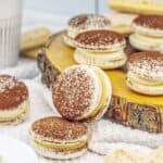 stacks of tiramisu macaron cookies.