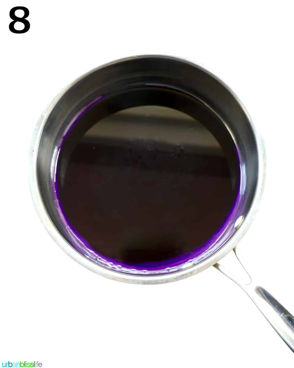 bright purple ube condensed milk in a saucepan.