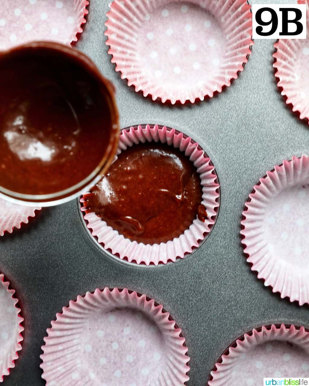 pouring chocolate cupcake batter into prepared cupcake liners.