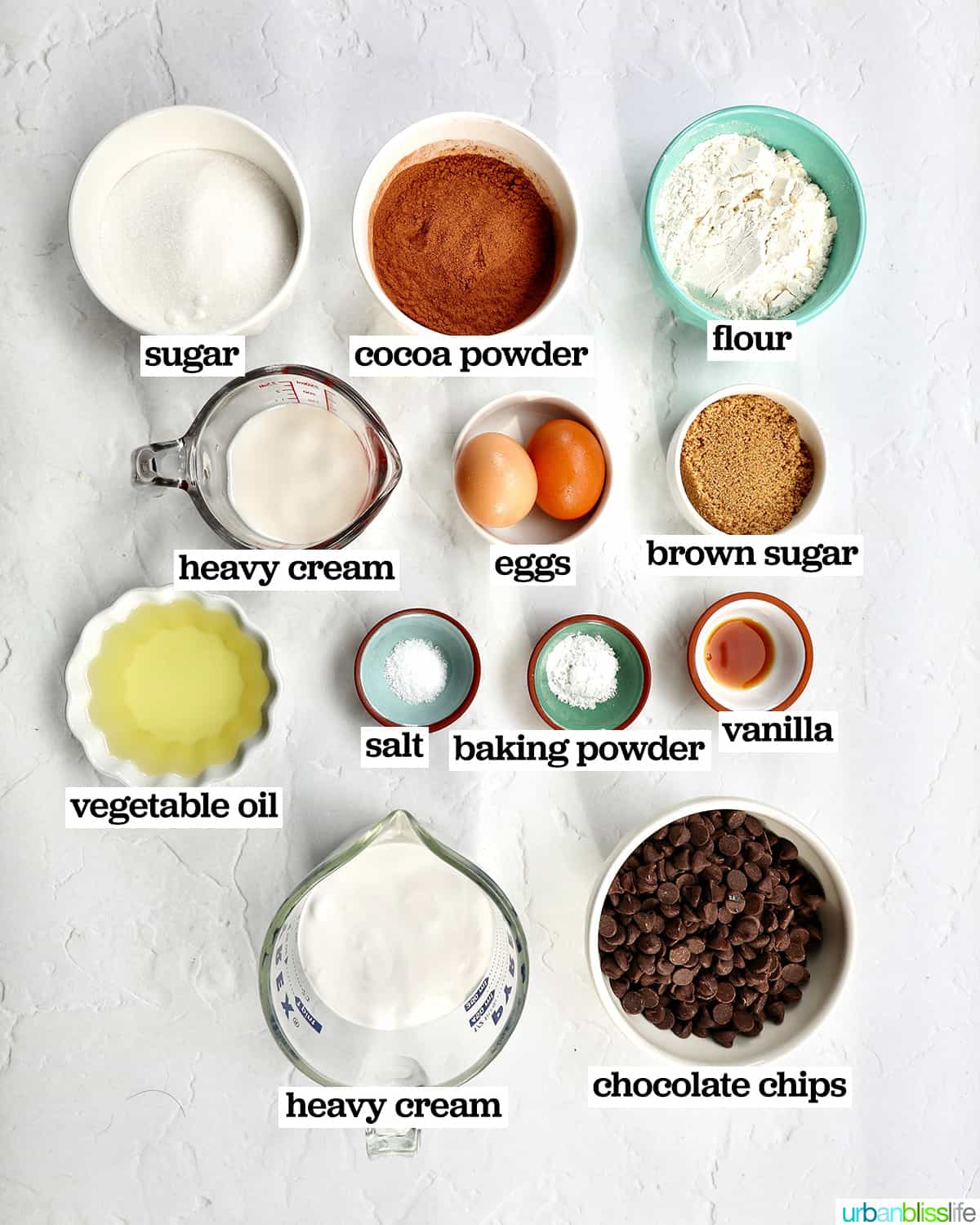bowls of ingredients to make chocolate fudge cupcakes.