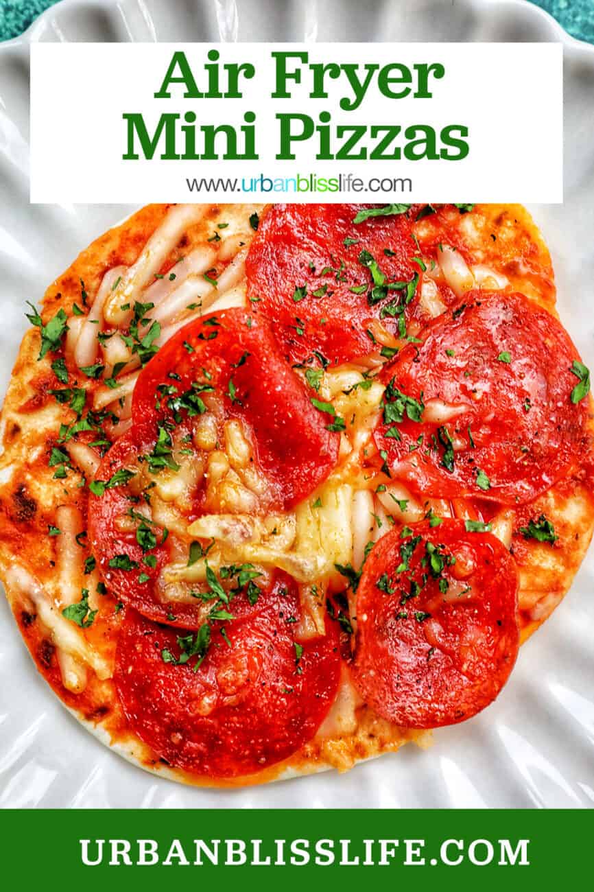 single air fryer mini pepperoni pizza on a scalloped plate with title text overlay.