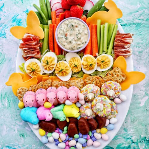 Easter Charcuterie Board with savory and sweet snacks.