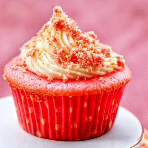 strawberry crunch cupcake in a polka dot cupcake liner.