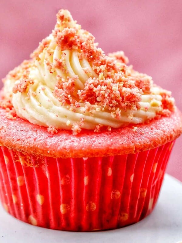 strawberry crunch cupcake in a polka dot cupcake liner.