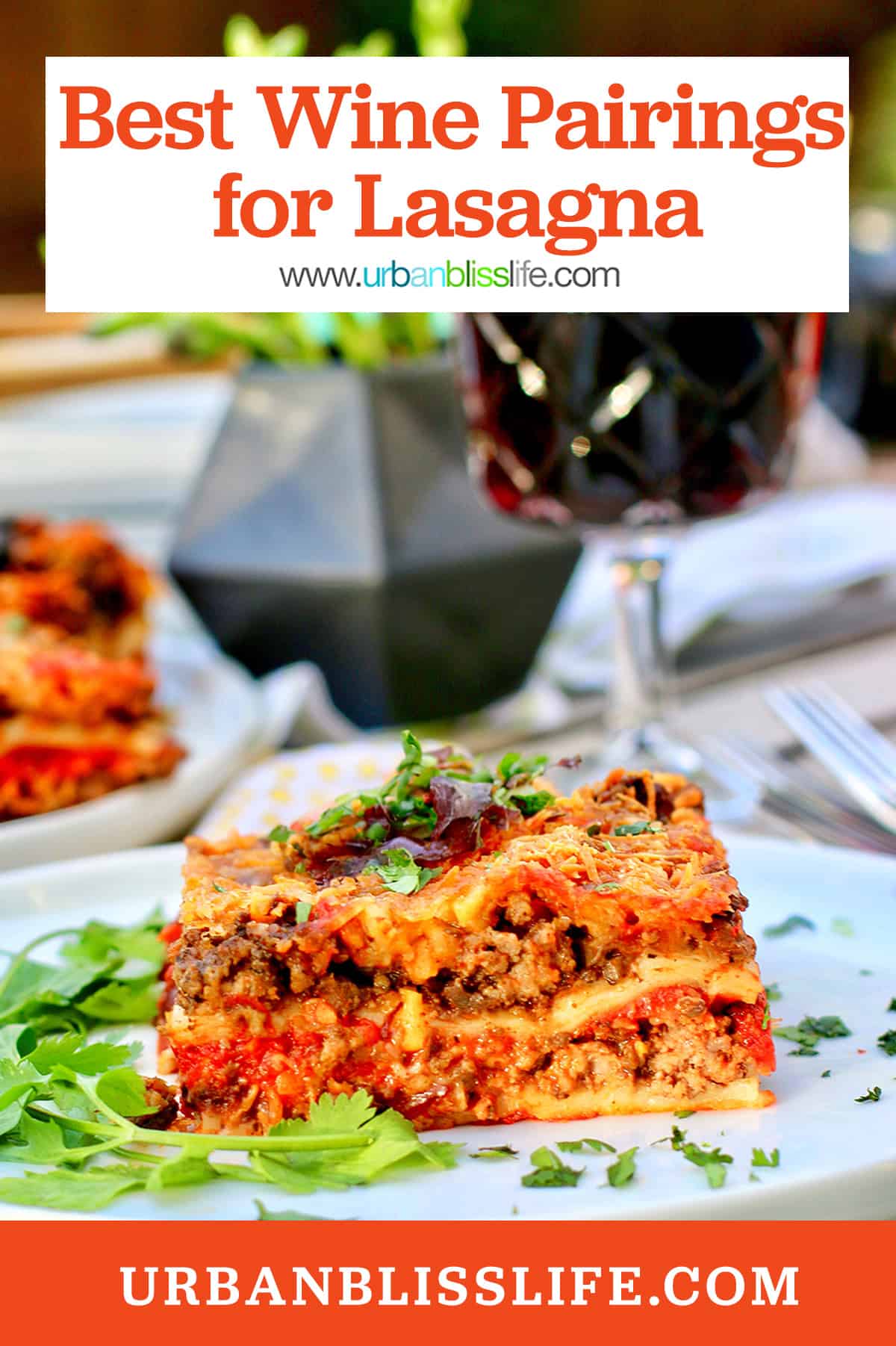 slice of lasagna in front of a glass of red wine with title text overlay.