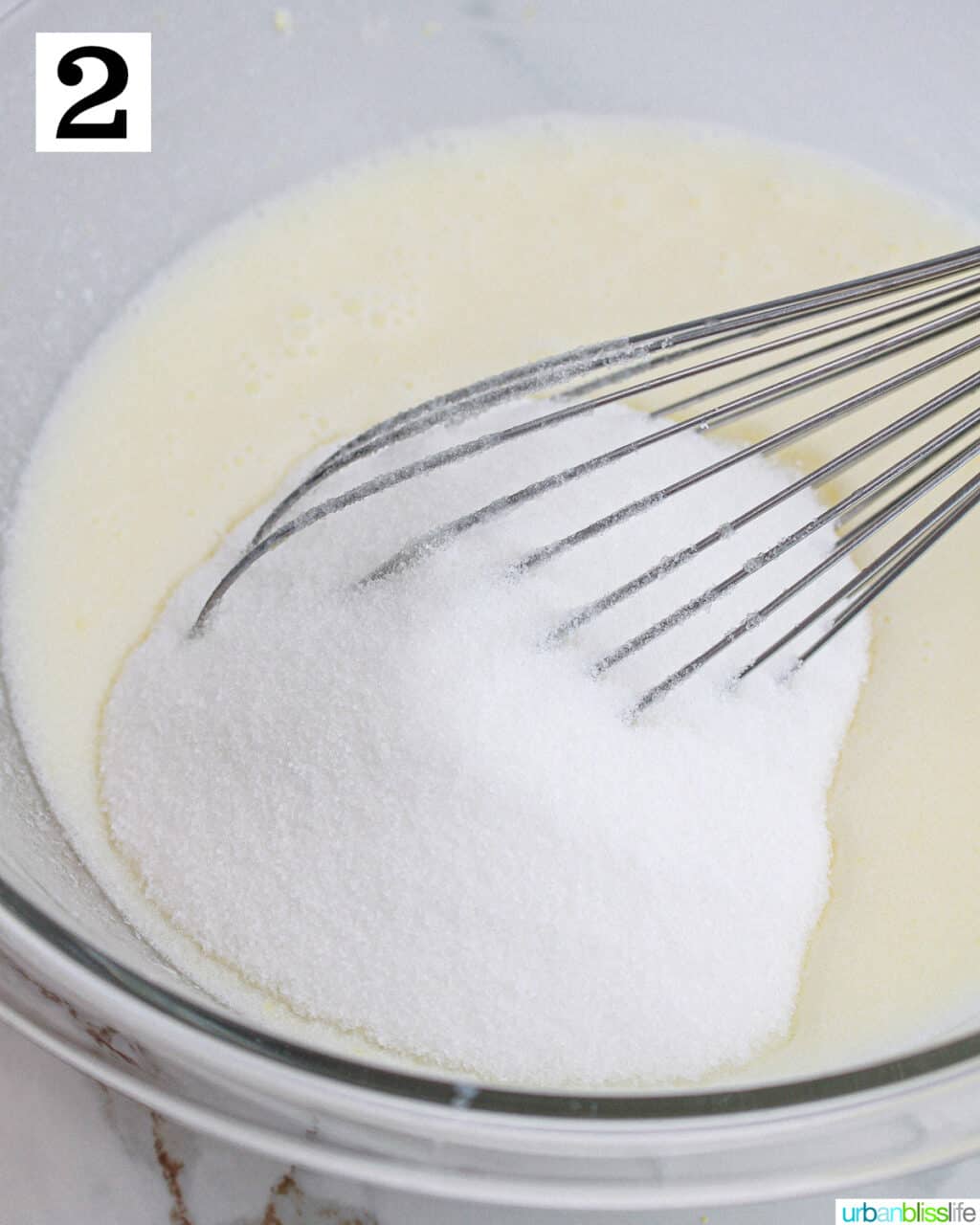 whisk with granulated sugar added to wet ingredients in cupcake batter.