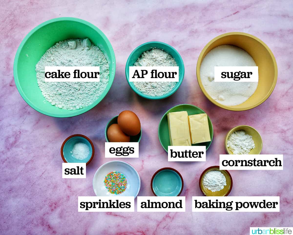 bowls of ingredients to make almond sprinkle cookies.