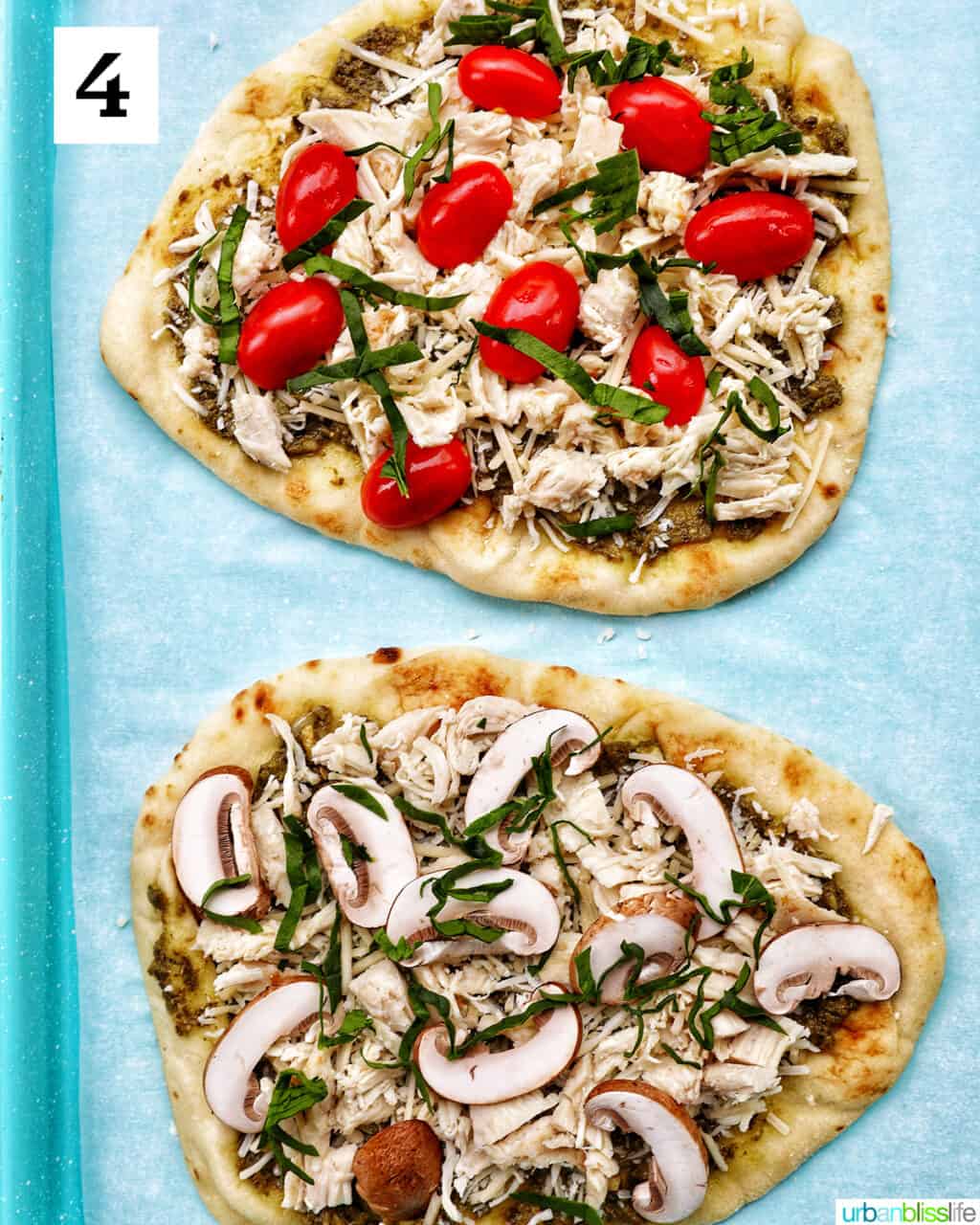 two chicken pesto flatbreads, one with tomatoes and one with mushrooms.