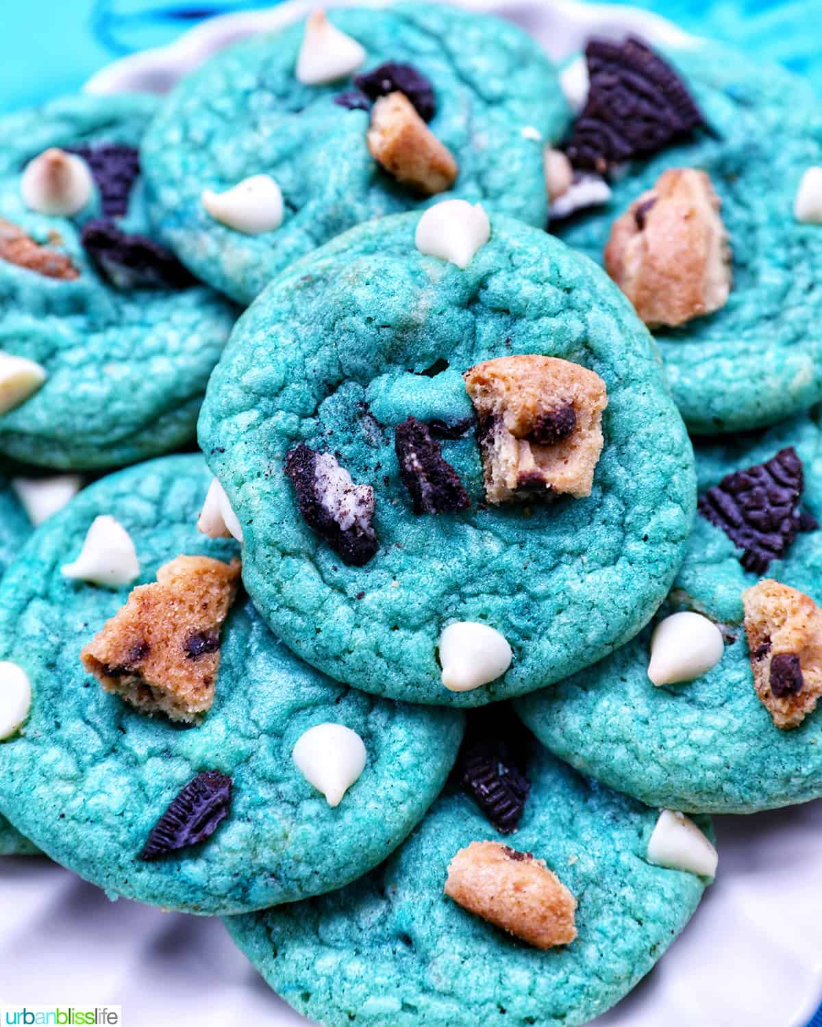 plate full of bright blue Cookie Monster Cookies.