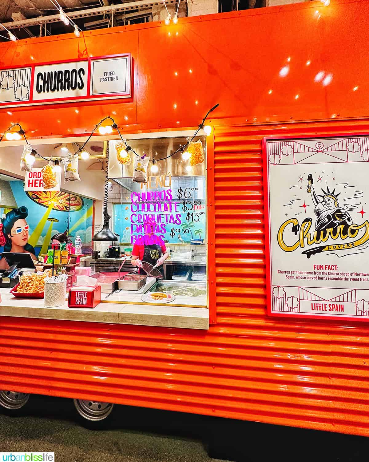 Churros cart at Mercado Little Spain in NYC.