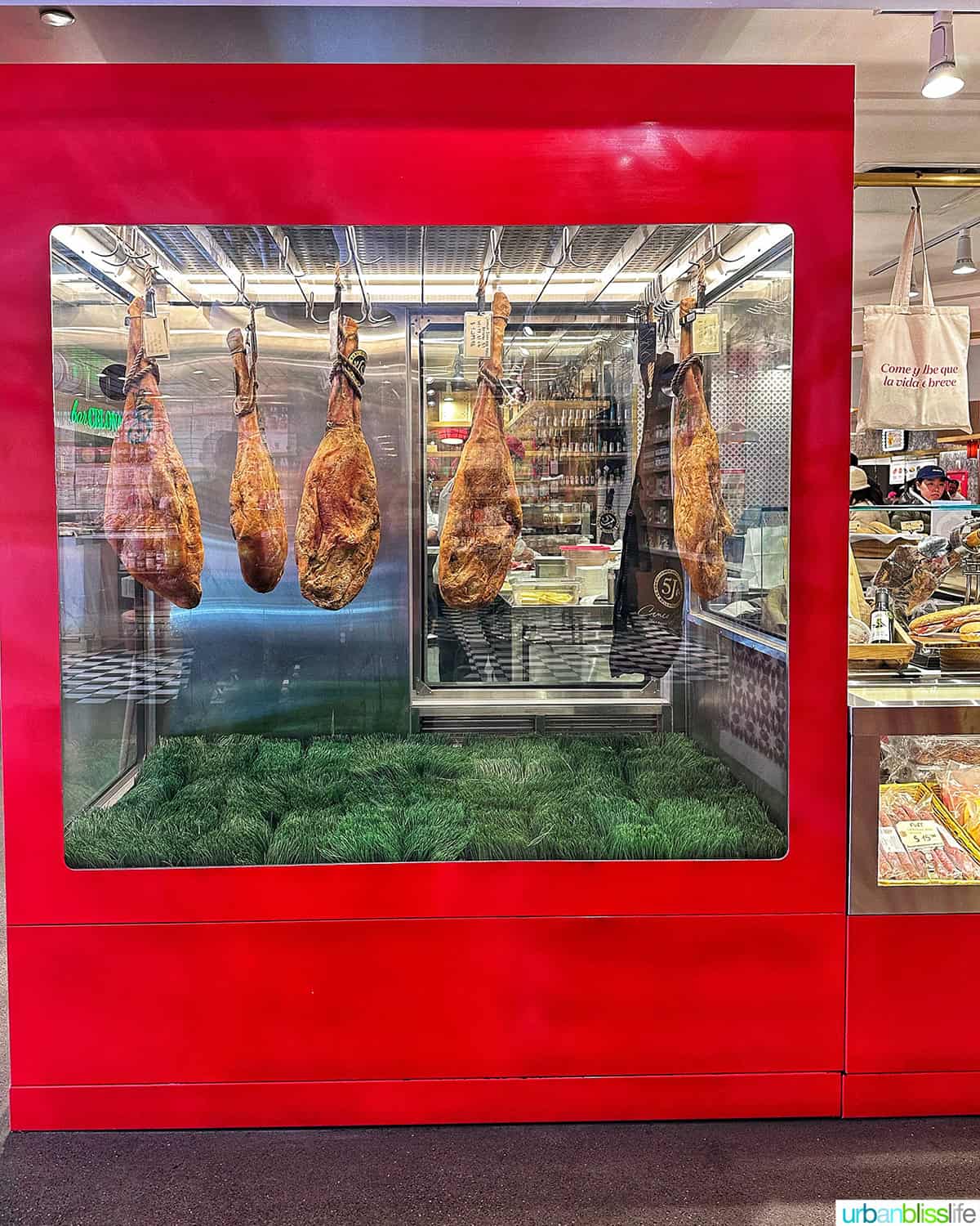 meat locker with iberico ham (jamon) at Mercado Little Spain in NYC.