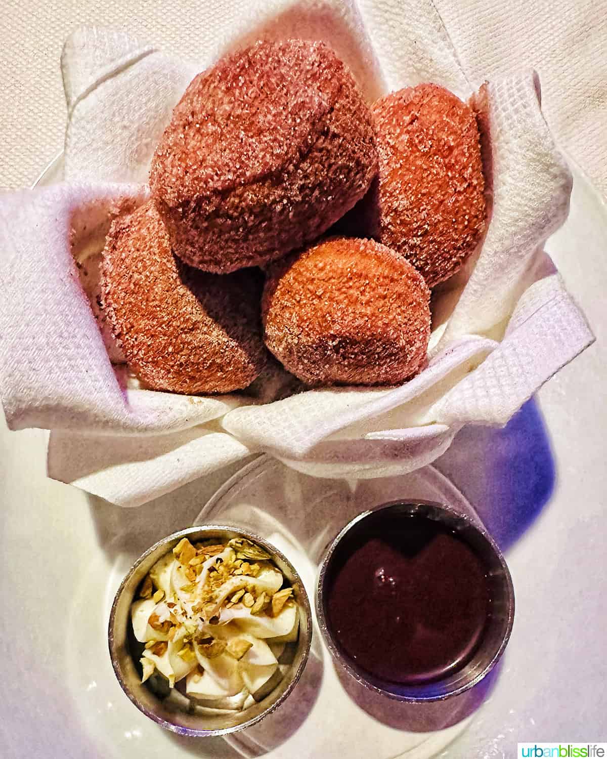 bowl of donuts and dipping sauces  at Marea restaurant New York City (NYC).