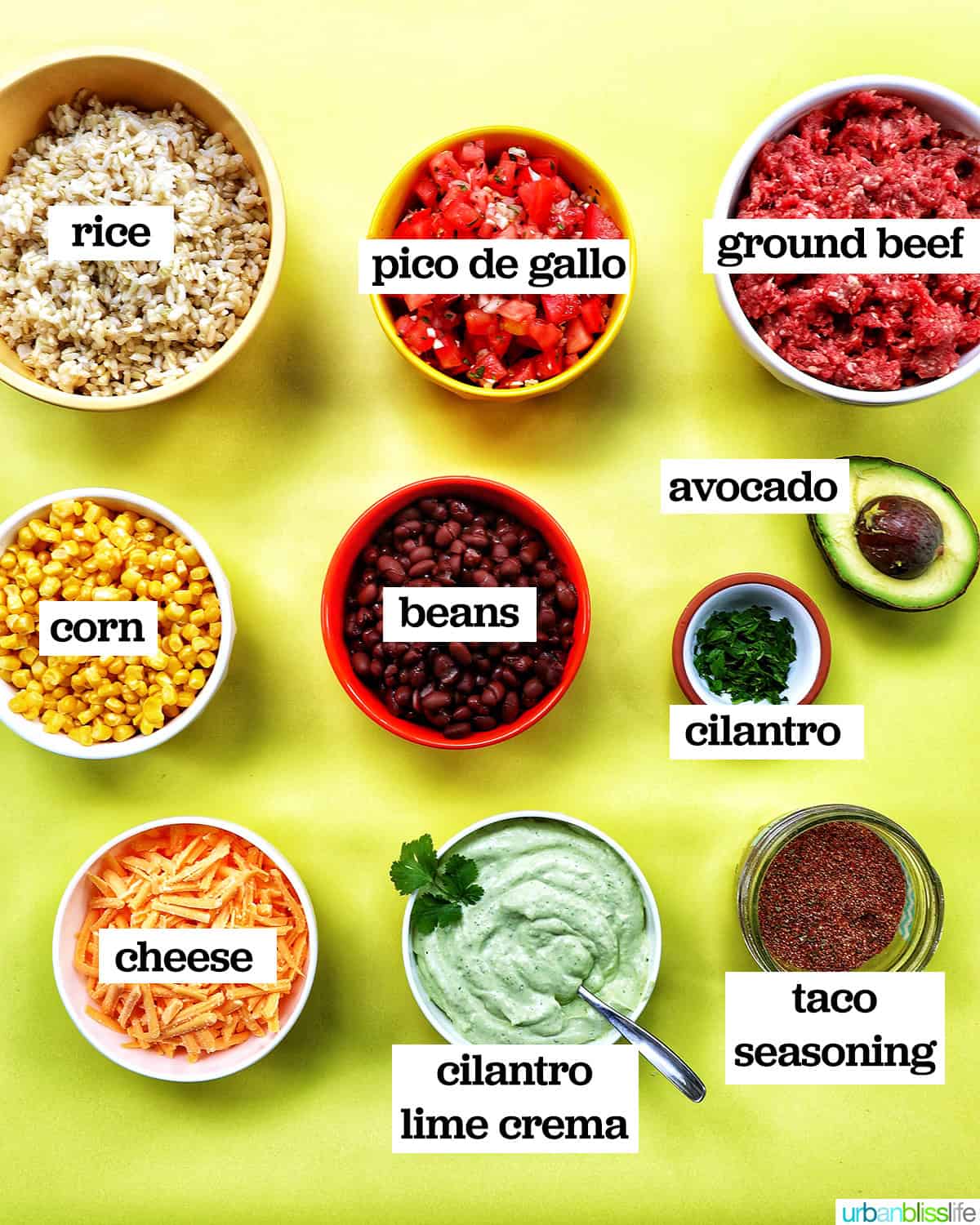 bowls of ingredients to make taco bowls.