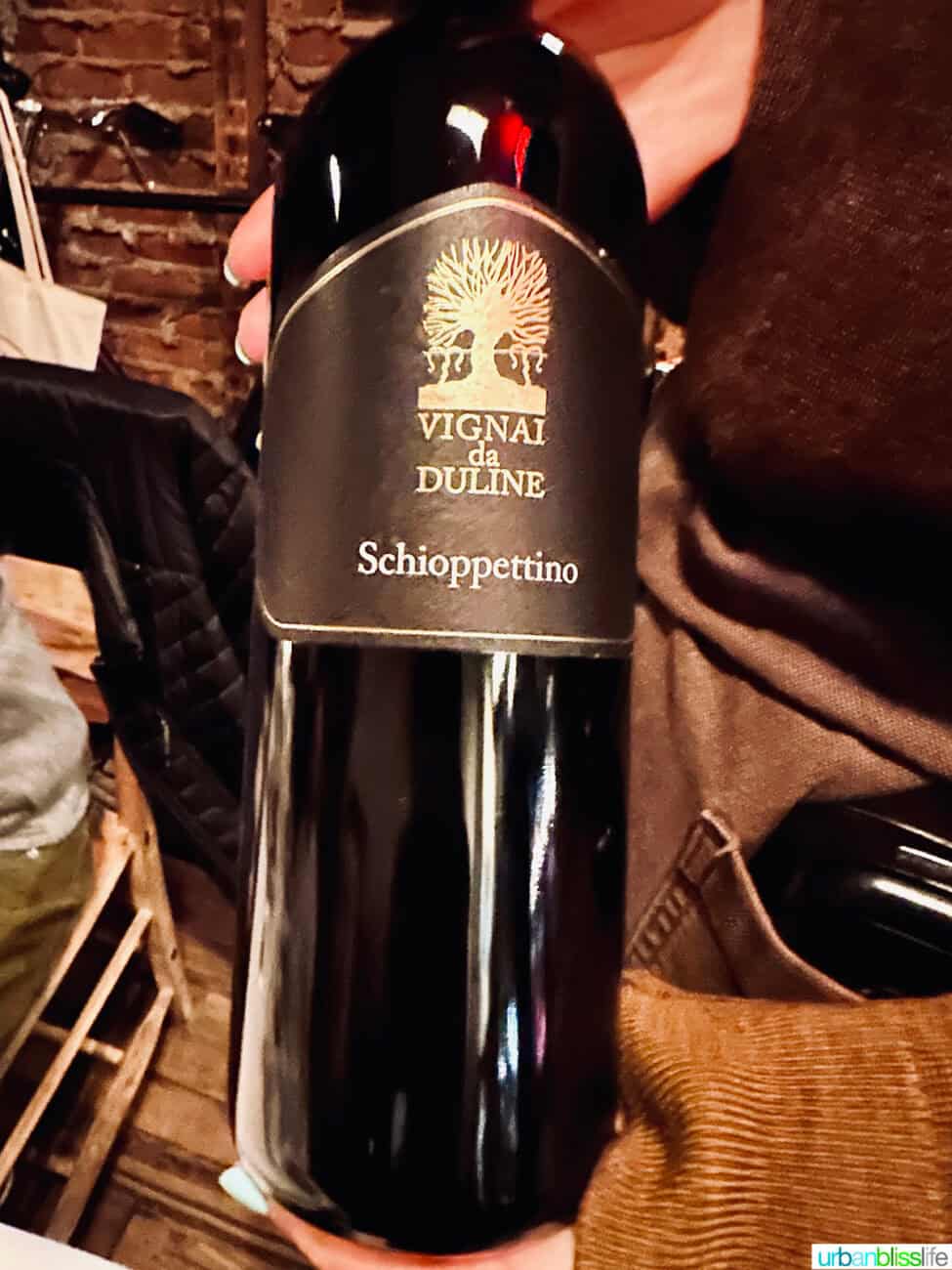 Bottle of Schioppettino wine at Via Carota restaurant.