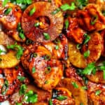 BBQ chicken and pineapples with herbs.