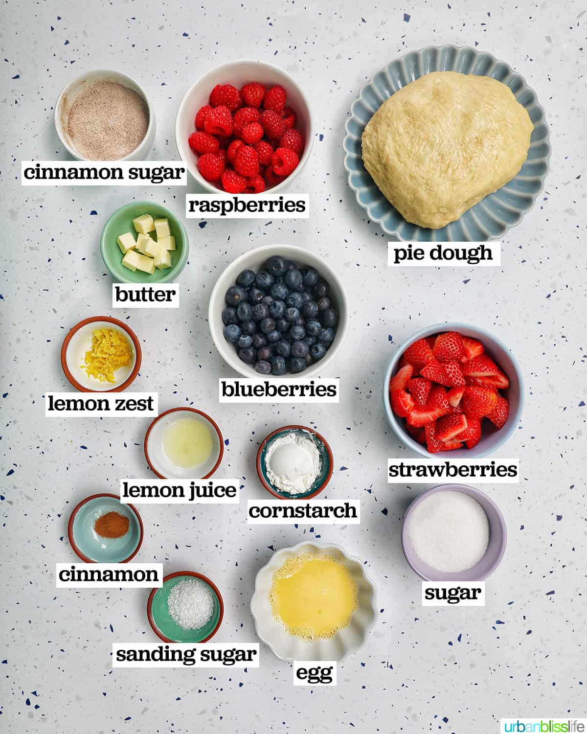 bowls of ingredients to make a mixed berry galette.