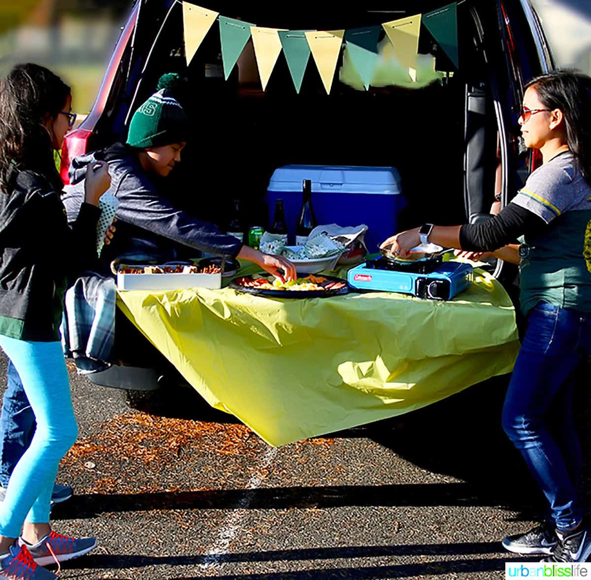 Marlynn and kids tailgating.