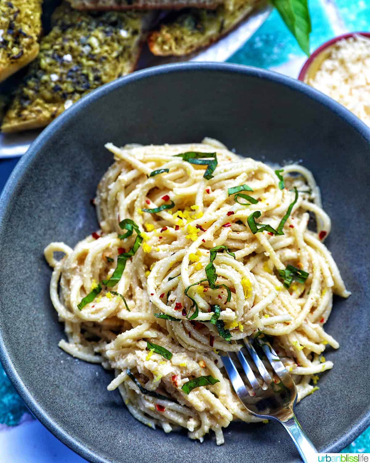 bowl of tahini pasta with fork.