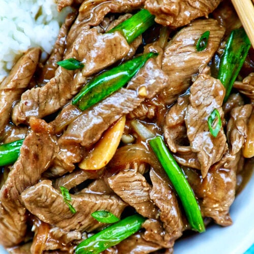 bowl of beef and onion stir fry.