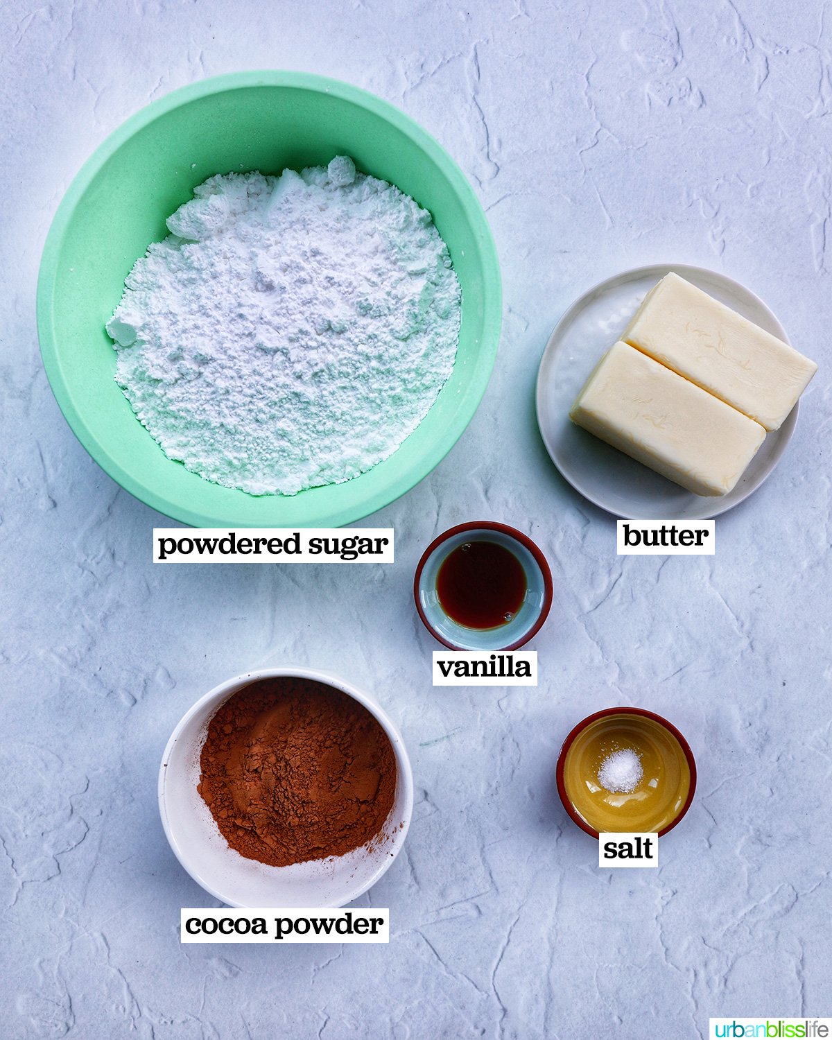 ingredients to make buttercream frosting for football cupcakes.