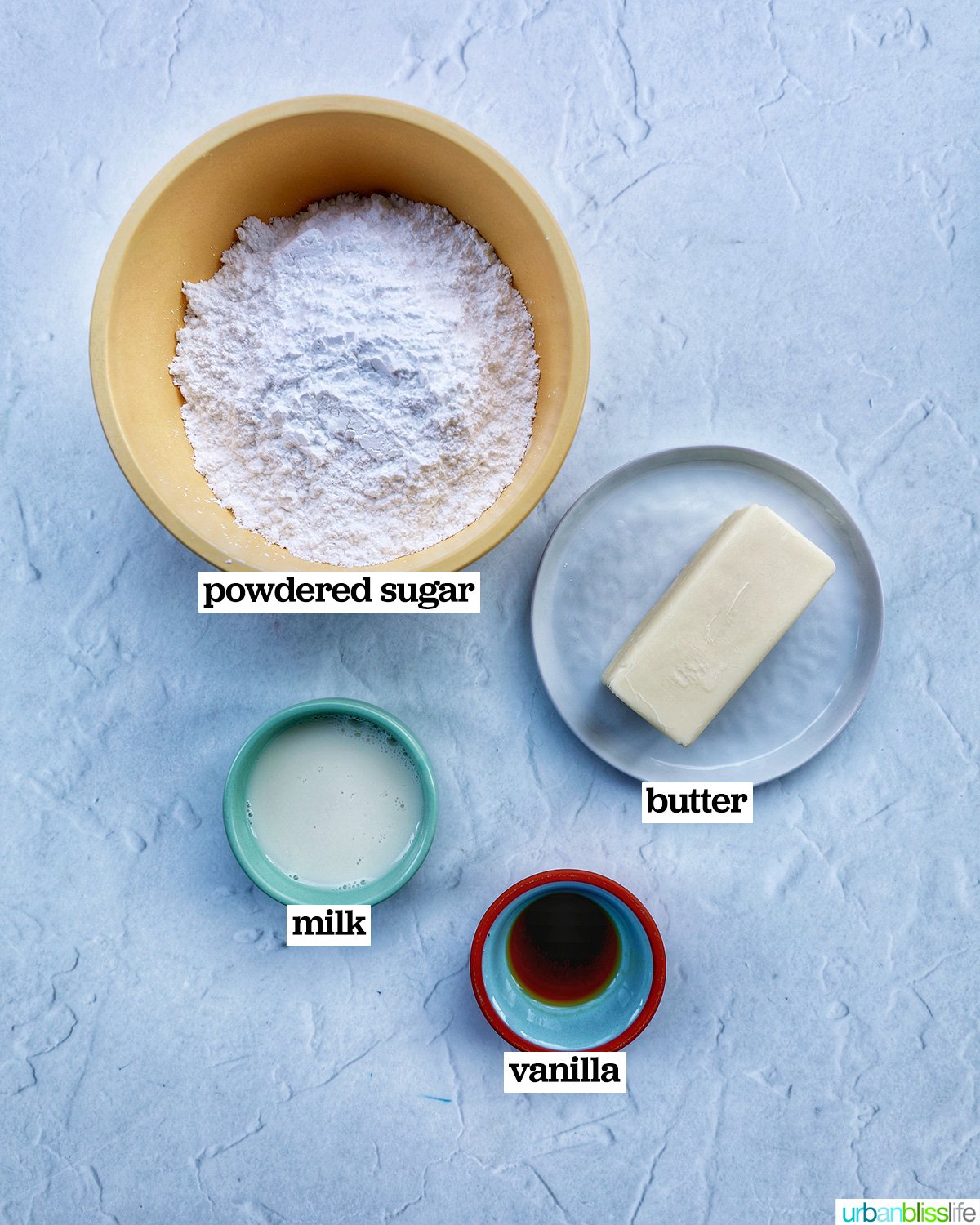 ingredients to make vanilla buttercream frosting.