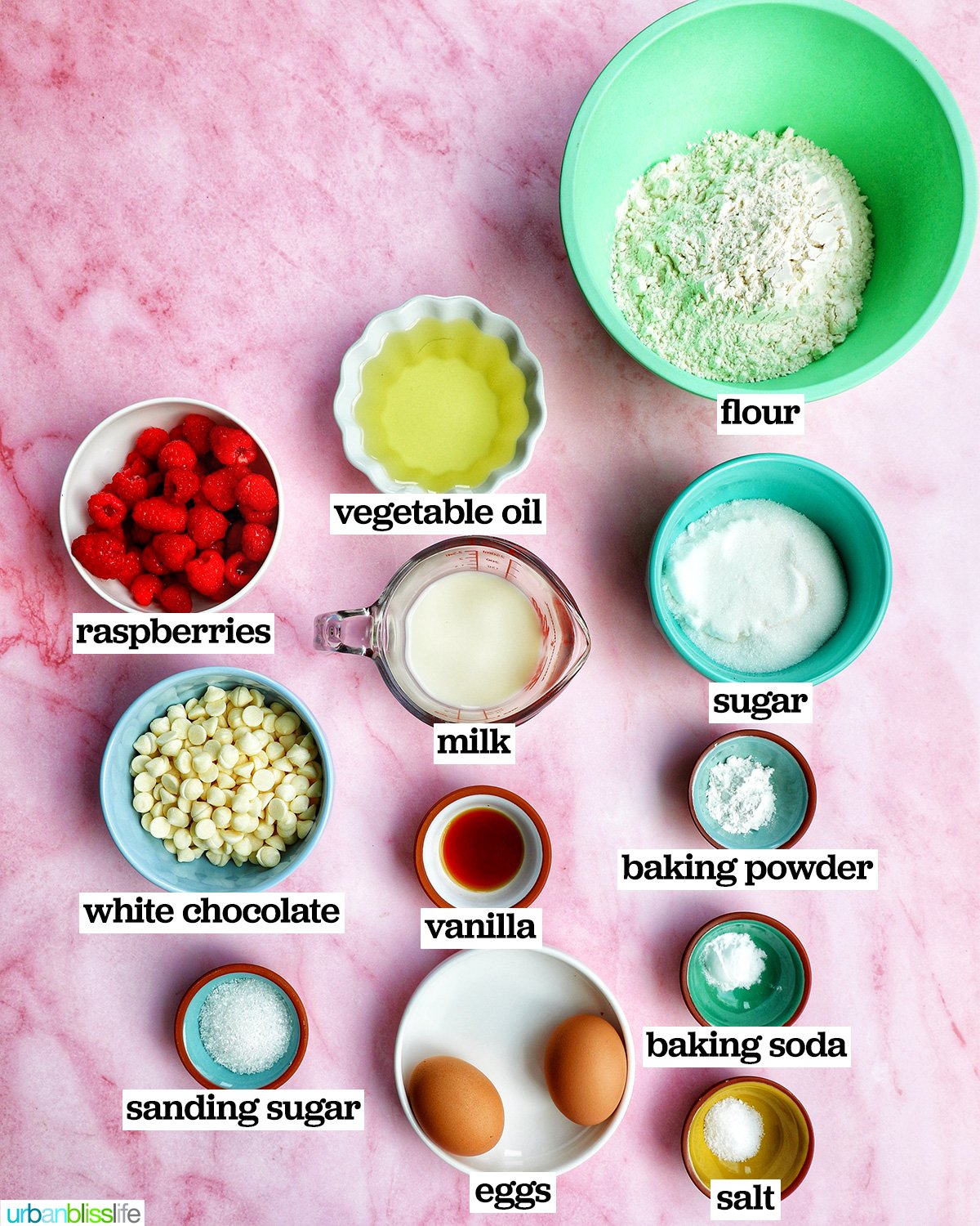 bowls of ingredients to make raspberry white chocolate chip muffins