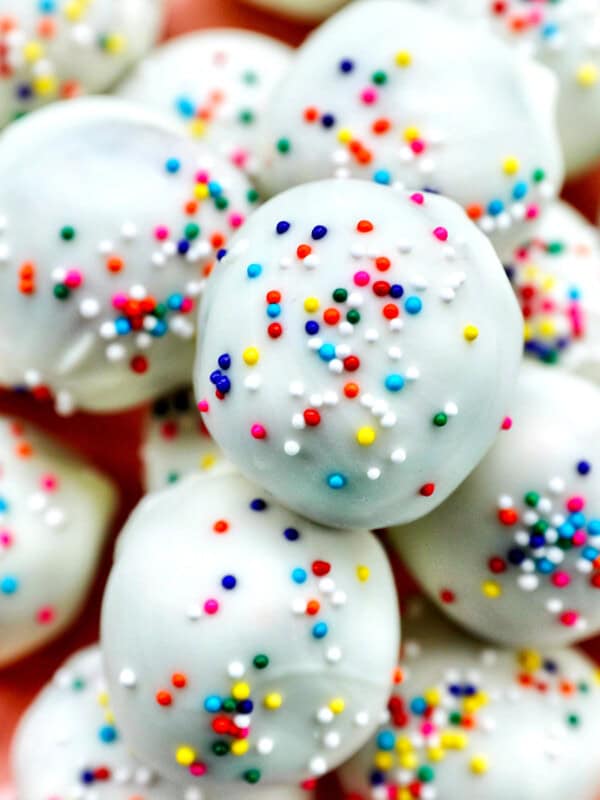 plate of colorful birthday cake truffles.