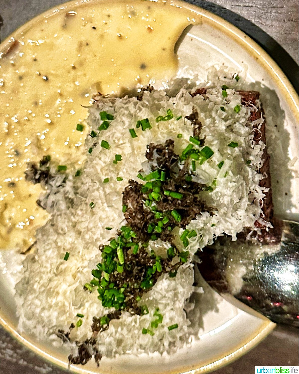 crispy potatoes and cheese at Carlotto restaurant in NYC New York.