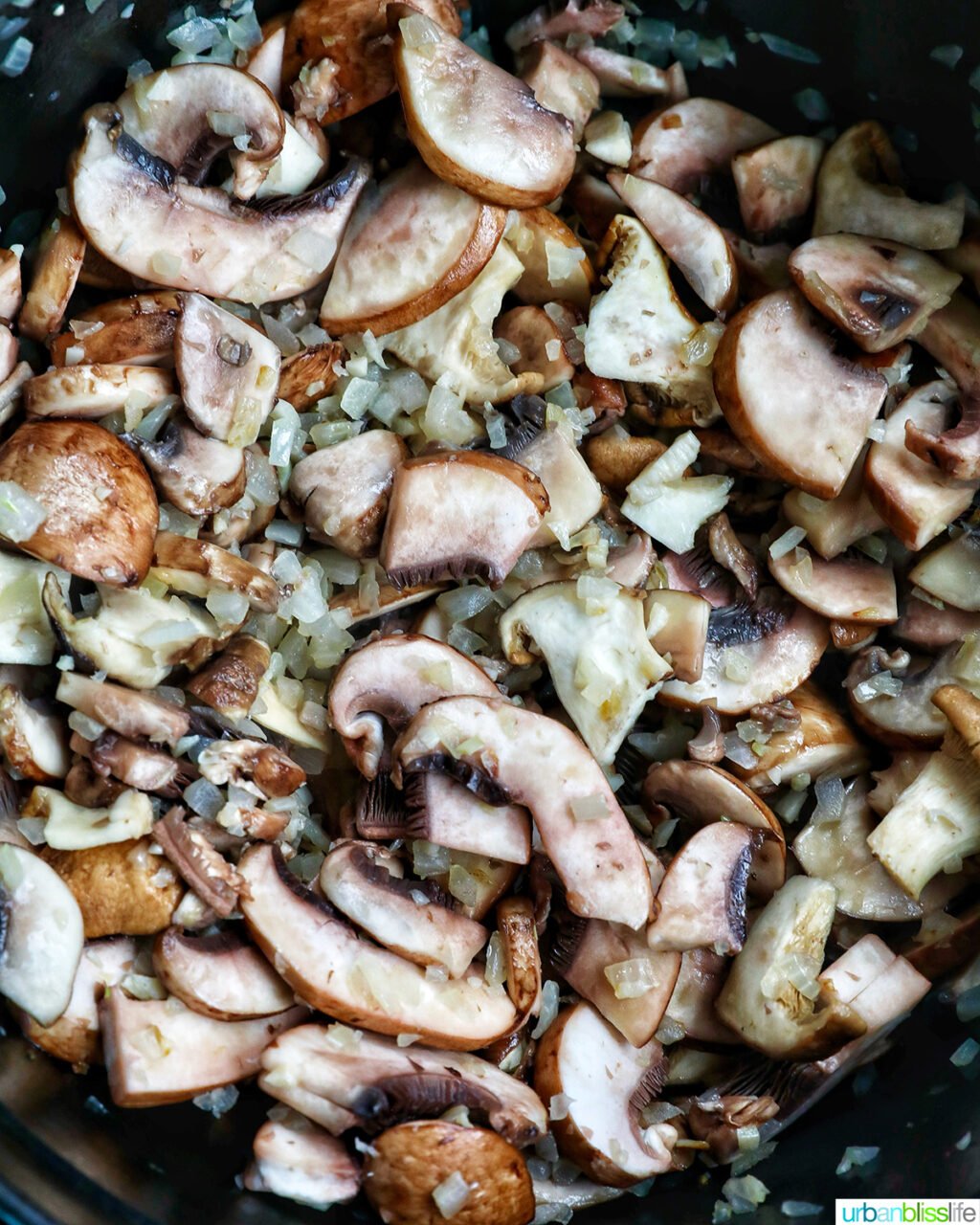 sliced mushrooms with onions and herbs.