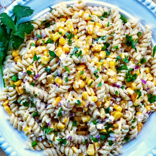 Mexican street corn pasta salad in a white bowl.