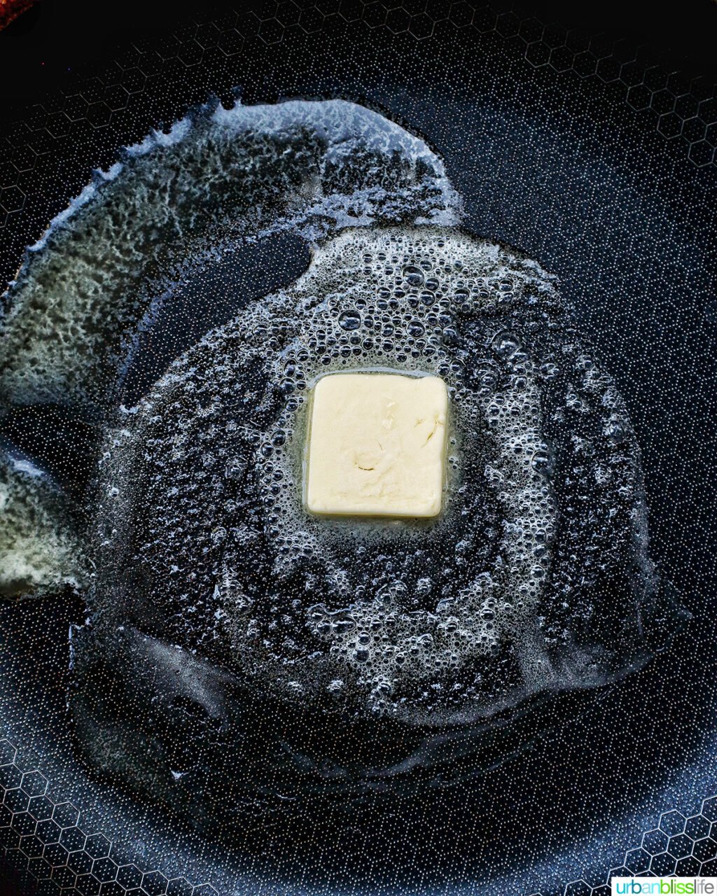 butter added to cast iron skillet.