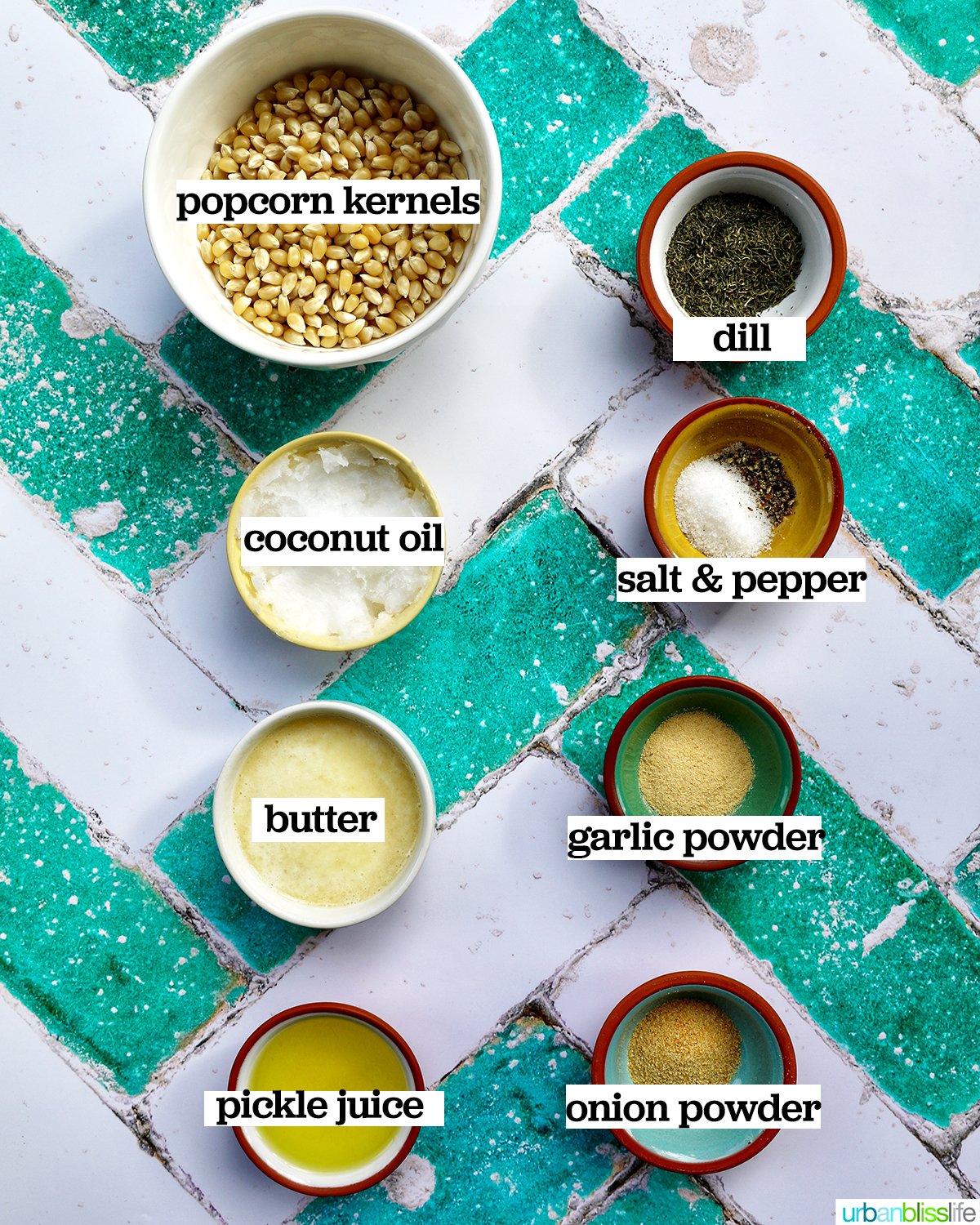 bowls of ingredients to make dill pickle popcorn.