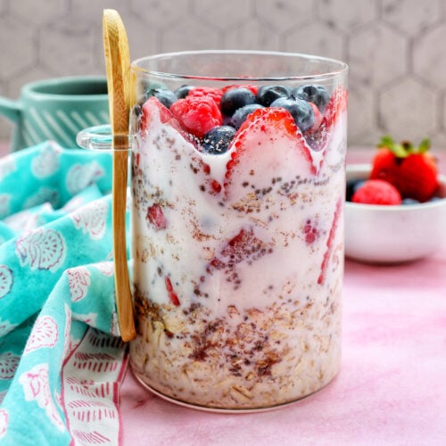 berry overnight oats in a mason jar.