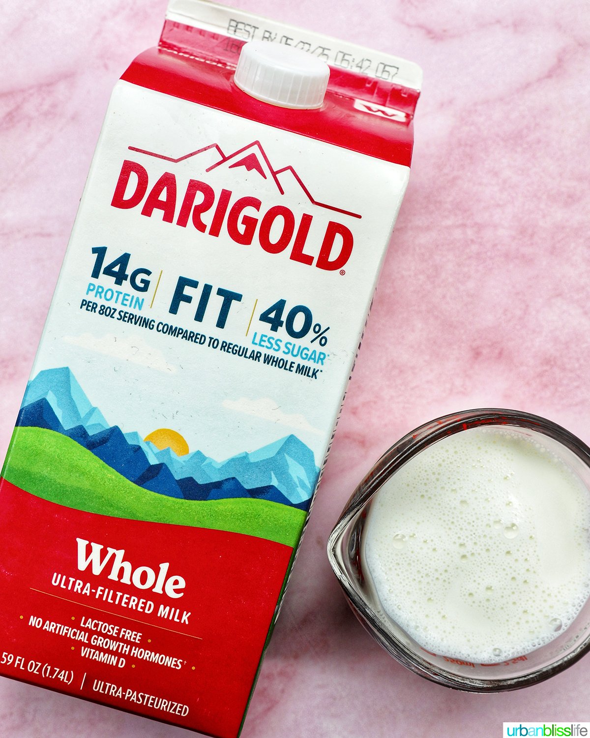Darigold milk in a carton and in a glass.