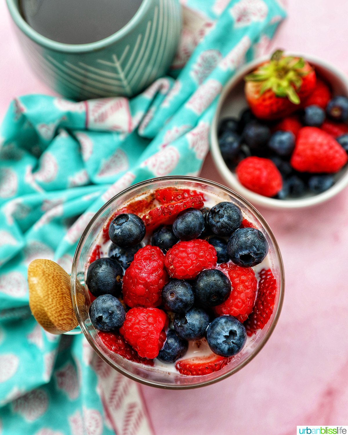 overhead of berry overnight oats in a mason jar..