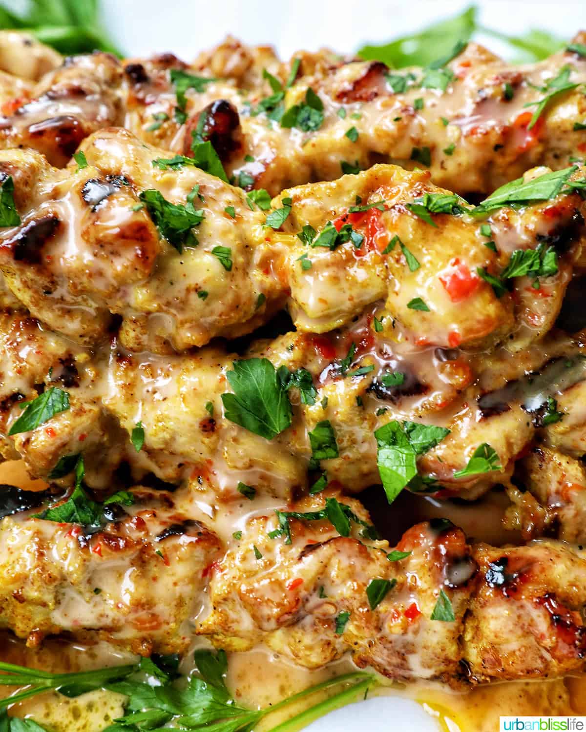 stack of bang bang chicken skewers.