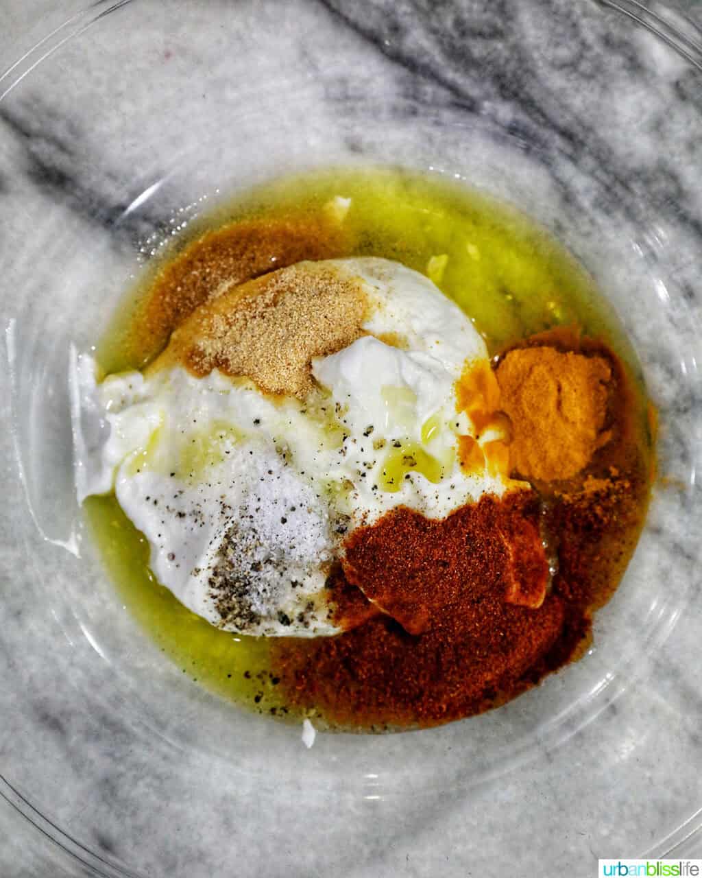 bowl of ingredients to make marinade for chicken skewers.