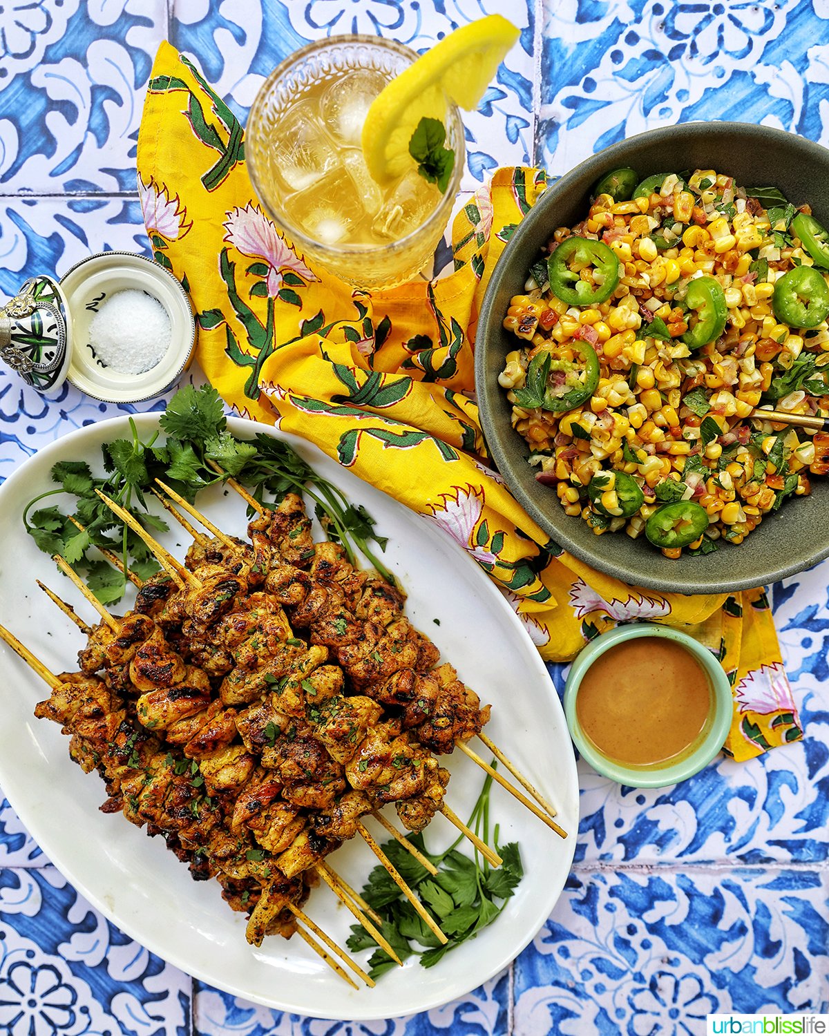 charred corn salad, tandoori chicken skewers, bourbon lemonade.