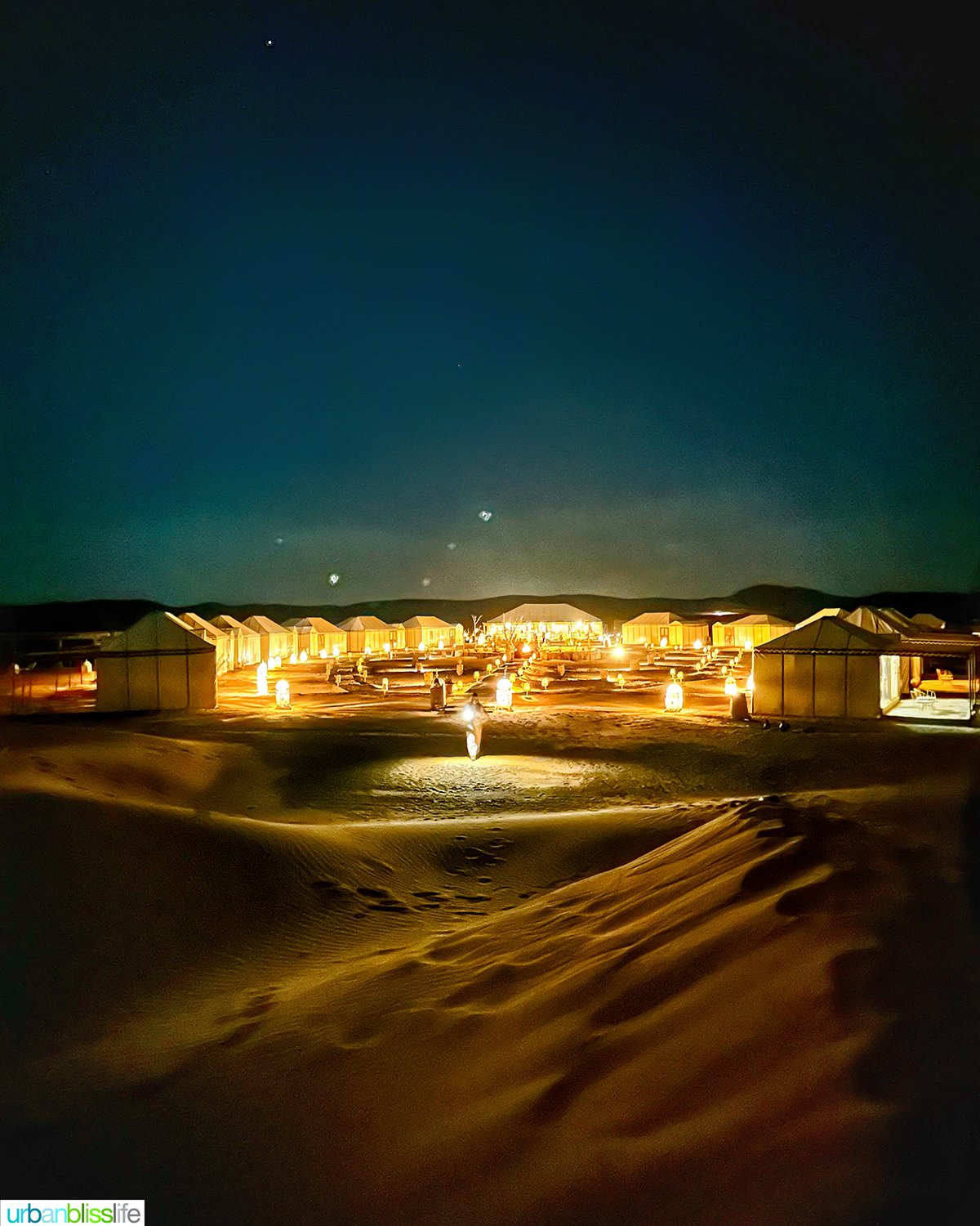 luxury desert camp at night in the sahara desert in Morocco.