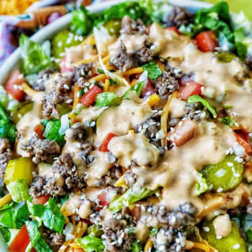 big bowl of Big Mac salad with toppings and Big Mac burger sauce dressing.