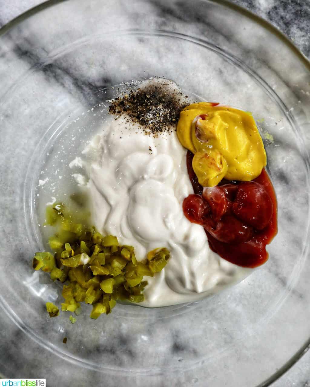 ingredients in a bowl to make big mac sauce.